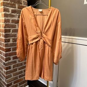 Brand new, never worn (without tags) Pocketed Plunge Mini Dress in Dusty Peach.